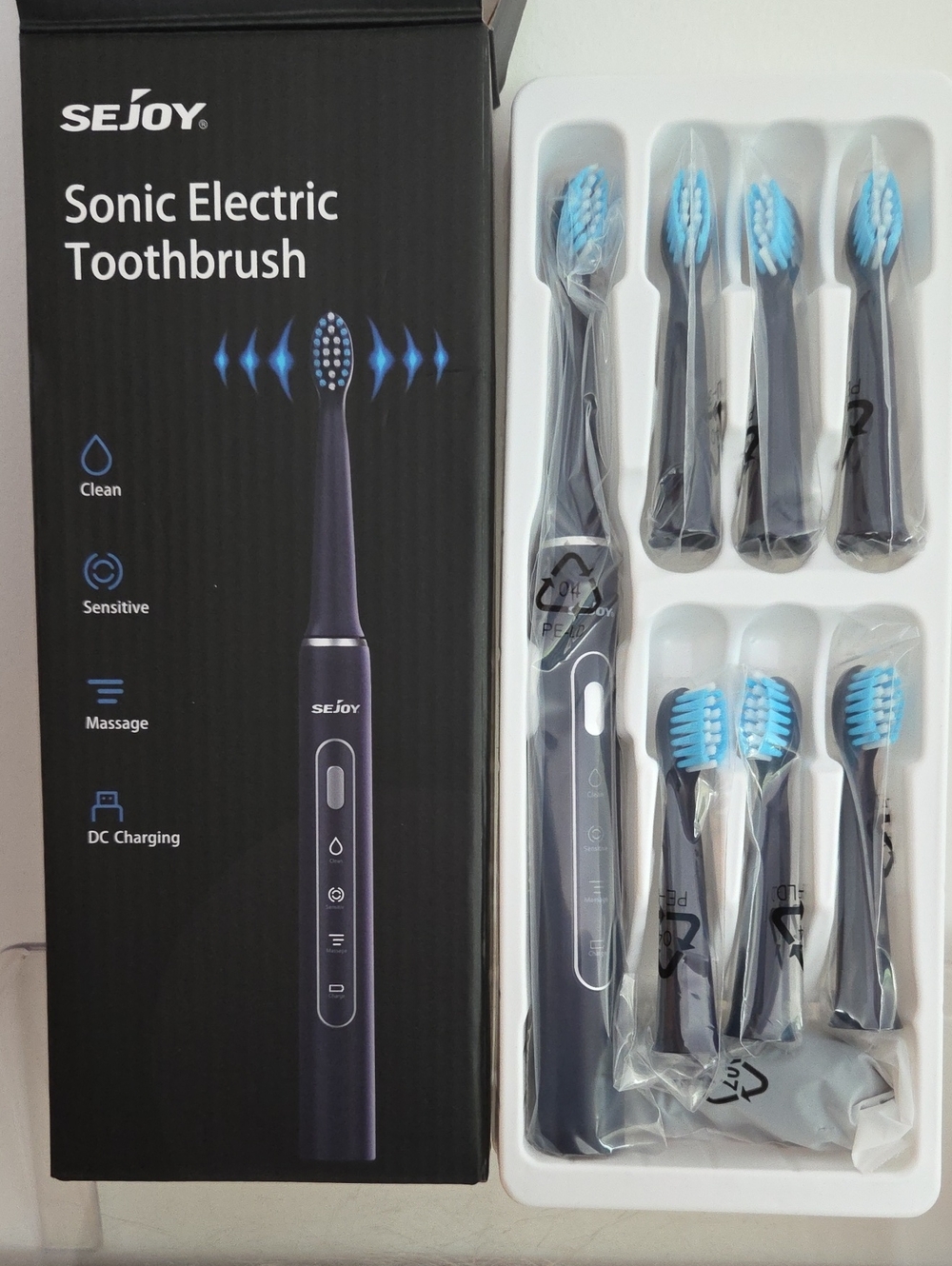 Black Sonic Electric Toothbrush with 6 Blue Brush Heads...NWT in Box